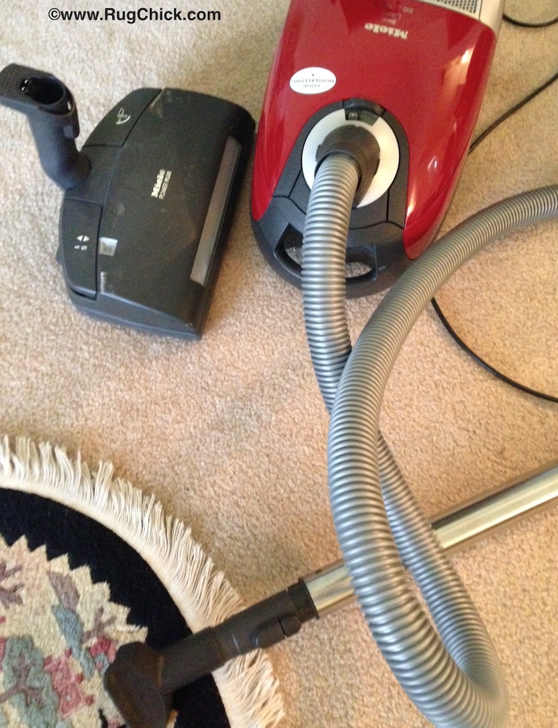 My Miele vacuum. I use it on floors, carpeting, and my woven rugs.