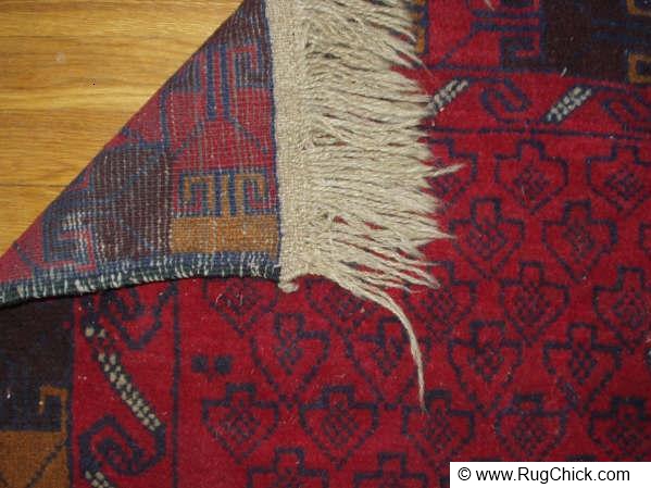 Back corner of an Afghan rug