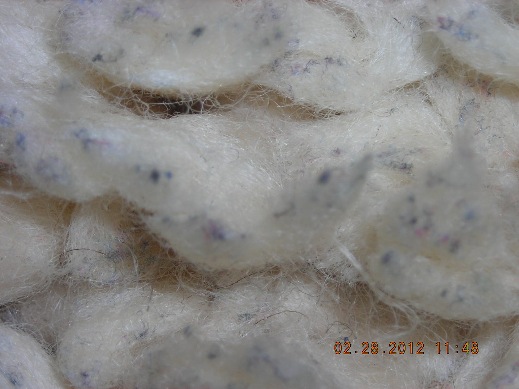 Wool shag that picked up black flecks from a husband’s socks 