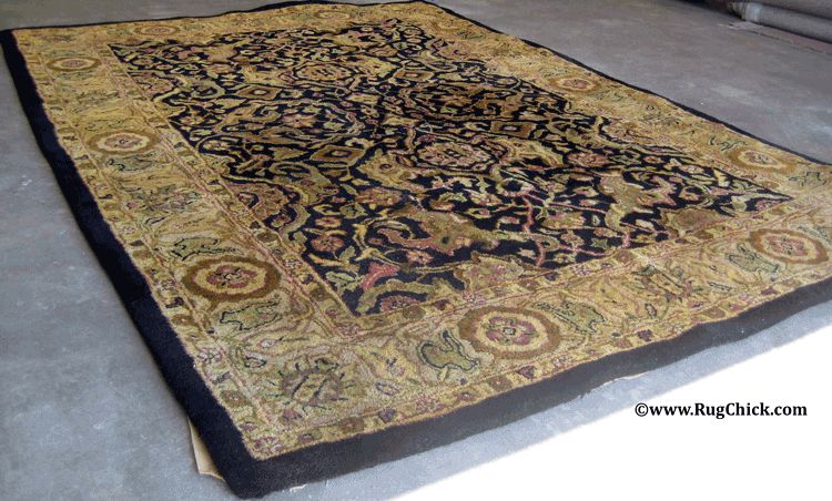 Tufted rug lost its shape after the latex deteriorated from a flood.