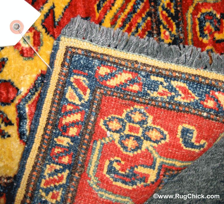 Rugs with material on the back