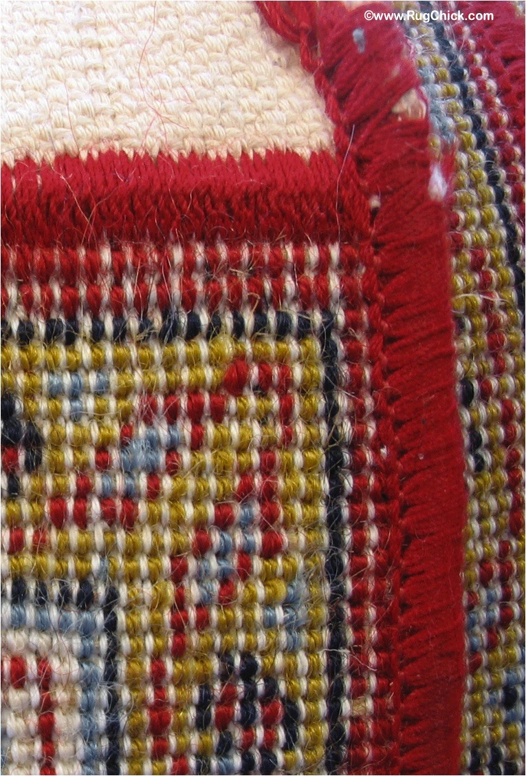 Machine woven rugs have the wool wrapped around the wefts (wefts run “weft” to right). Fringe is sewed on by machine and sides sewn on too.